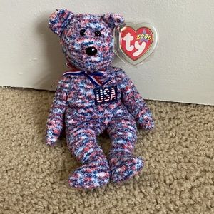 2000's Ty Beanie Baby (USA Bear) with tag errors.